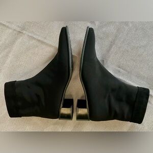 Black Stuart Weitzman gore Tex ankle zip boots square toe.